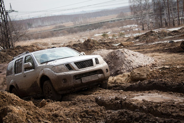 Obraz na płótnie Canvas Offroad car in dirt