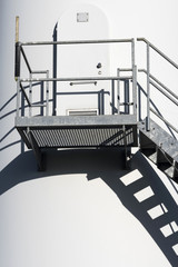 Steps leading into a commercial wind turbine at a wind farm