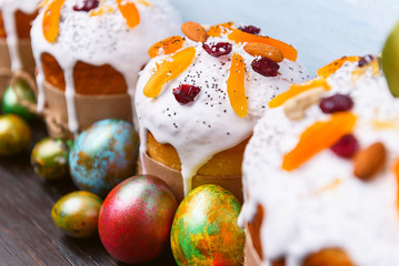 classic Slavic Easter cakes with Easter eggs on a wooden table