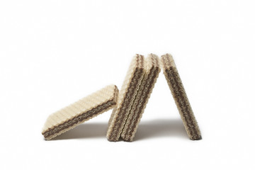Chocolate Wafers Leaning Against Each Other, Isolated On White Background