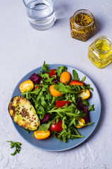 Raw arugula with vegetables