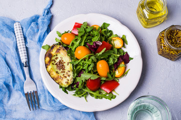 Raw arugula with vegetables