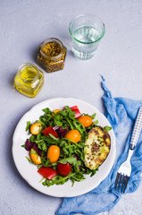 Raw arugula with vegetables