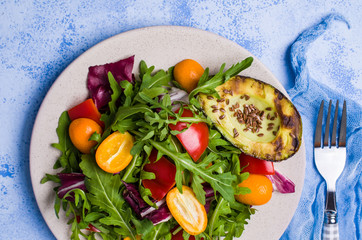 Raw arugula with vegetables