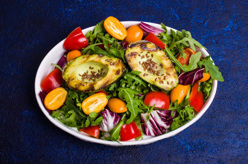 Raw arugula with vegetables