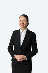 Business woman in suit smiling with isolated background