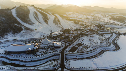 PYEONGCHANG, SOUTH KOREA: Winter view of ski resort in Pyeongchang, South Korea. Sports facility for the Winter Olympic Games in 2018 - obrazy, fototapety, plakaty