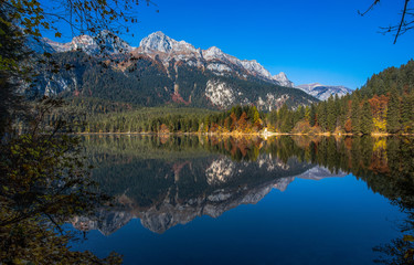 Autumnal view of Tovel lake, Val di Non within the Adamello-Brenta Natural Park, Trentino Alto-Adige, Italy.