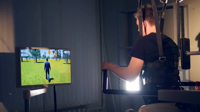 A exoskeleton with a game controls for medical use.  