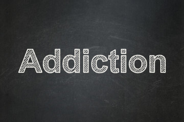 Obraz premium Medicine concept: text Addiction on Black chalkboard background