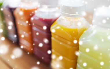 bottles with different fruit or vegetable juices