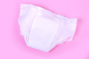 diapers for children on a pink background