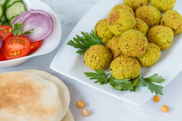 Fresh baked falafel with pita. Vegan dietary healthy food concept.