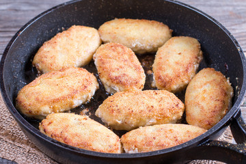 Cutlets fried in a pan, closeup