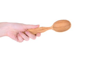 kitchen spoon in hand