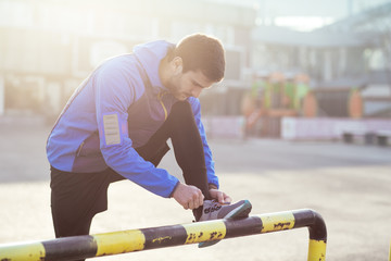 Runner Tying a Shoelace