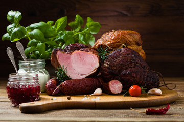 Smoked pork on wooden board.