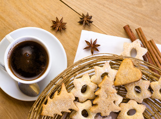 Obraz na płótnie Canvas Cup of coffee with Christmas cookies