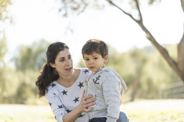 Mother and son in outdoors image in forest.