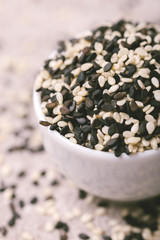 Black and white sesame seeds. Copy space. Top view.
