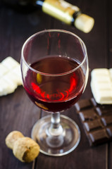 red wine in a glass on a large scale table