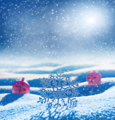 Winter background. Christmas holiday background with snowflake and balls in snowdrifts