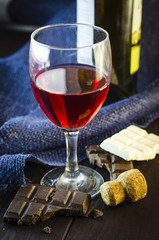 red wine in a glass on a large scale table