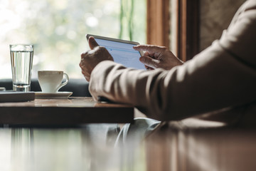 Businessman Using Tablet