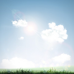 Obraz na płótnie Canvas grass, sky and clouds