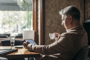 Businessman Using Tablet