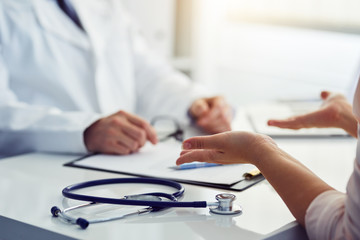 Patient consult his problems with the doctor in the office