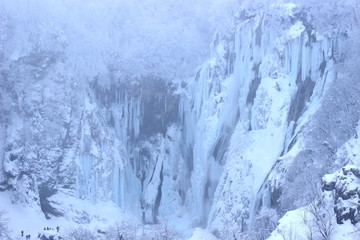 Fototapeta na wymiar Frozen waterfalls in National park Plitvice lakes, Croatia, winter scene