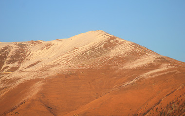 Naklejka premium mountain with the first snow in autumn