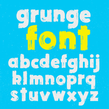 White and yellow grunge lowercase handwritten vector alphabet on blue background. Drawn by semi-dry brush with unpainted areas.