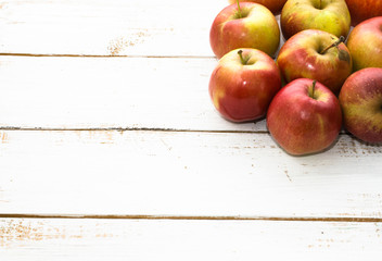 Red apples on wooden table, red apple fruits on local farmer market