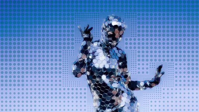 a dancer performs wearing an incredible disco mirror suit that sparkles in the light. this version has overlayed motion graphics effects