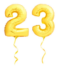 Golden number 23 twenty three made of inflatable balloon with ribbon isolated on white - obrazy, fototapety, plakaty