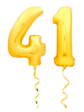 Golden number forty one 41 made of inflatable balloon with ribbon on white