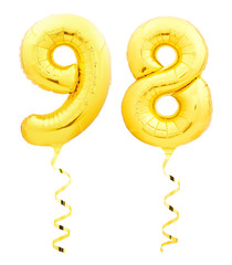 Golden number ninety eight 98 made of inflatable balloon with ribbon on white