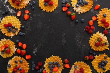 Round belgium waffles with berries