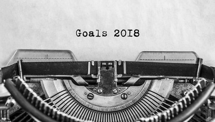 old vintage typewriter happy new year written goals 2018