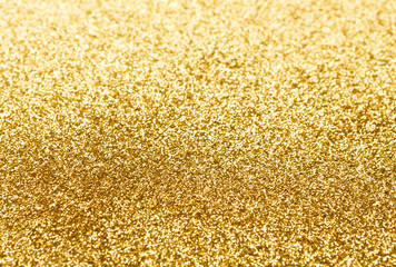 Golden glitter texture abstract background.