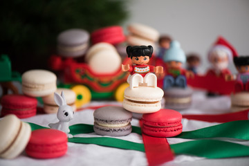 macarons on the Christmas table with Bricks waiting for guests