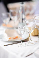 Beautiful table set with two glasses for wedding reception