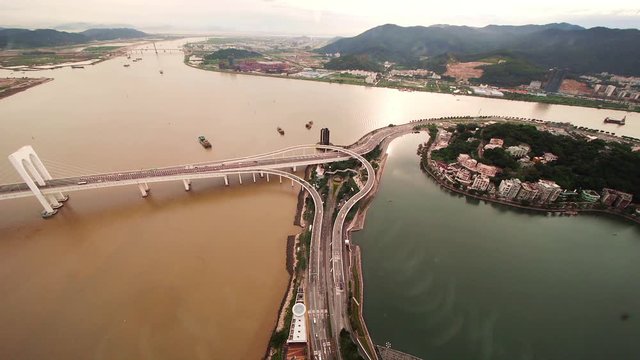 Wide shot Highway Stack Interchange in Macau from above - Avenida Panoramica do Lago Sai Van