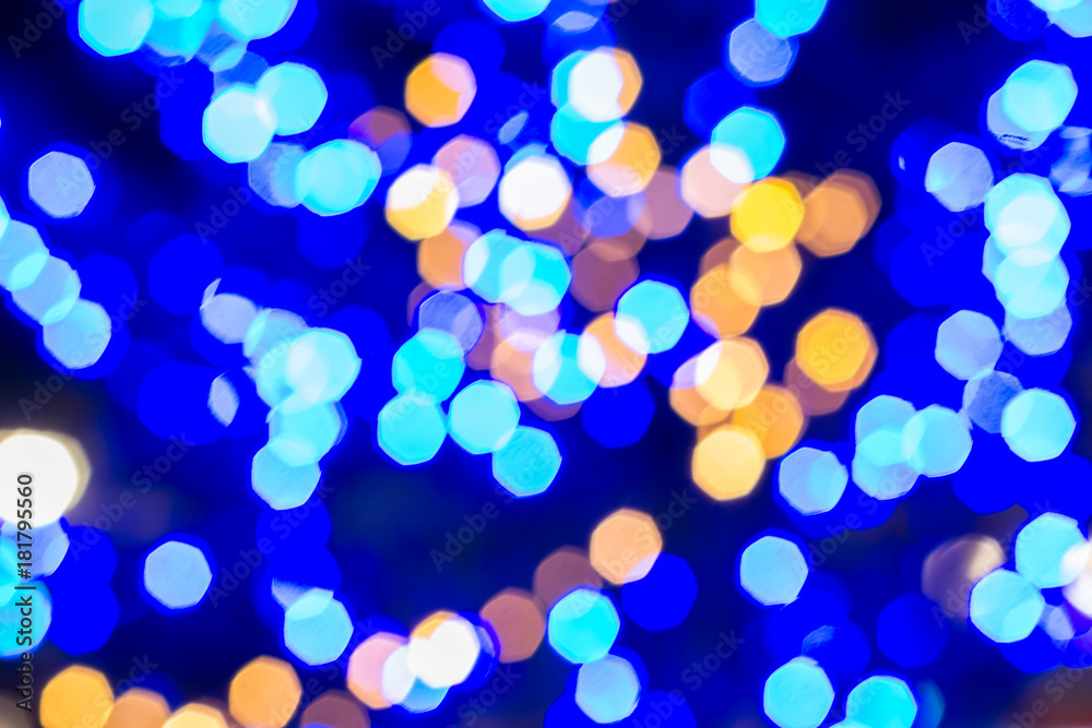 Wall mural abstract background with colorful bokeh blurred lights