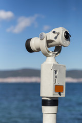 Binocular for tourists in the seaside city
