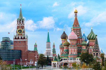 Fototapeta na wymiar The Kremlin, Spasskaya tower and St. Basil's Cathedral