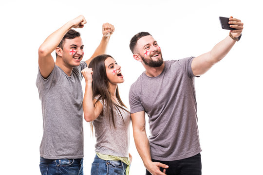 Group of football fans take selfie England national team on white background. Football fans concept.