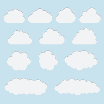 Collection of white paper cut out cloud icons, signs,weather symbols